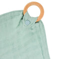 Load image into Gallery viewer, Close-up of removable teether ring and snap for easy washing.
