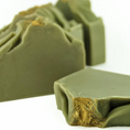 Load image into Gallery viewer, Australian Olive Green Clay Soap for acne, balancing oils, deep hydration, reduces scars. Suitable for normal to oily and combination skin. Scented with tea tree, eucalyptus, lavender, litsea cubebe.