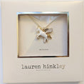 Load image into Gallery viewer, Lauren Hinkley Unicorn Necklace displayed in a gift box, featuring a charming unicorn pendant and an adjustable chain