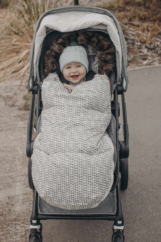 Nordic Footmuff Pram Liner - Raindrops design, reversible, all-weather pram liner, fits all prams, cozy and warm, machine washable, faux fur details.