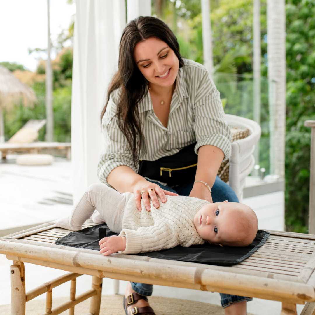 Hackerlily Travel Change Mat, lightweight, compact, fits in HipSurfer. Perfect for easy diaper changes on the go. Made of premium polyester, easy to clean.