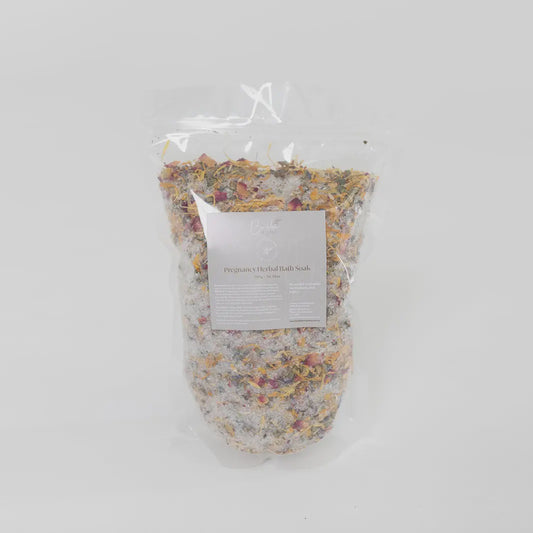 Pregnancy Herbal Bath Soak with Epsom salts, Pink Himalayan Salt, essential oils, and botanicals for a soothing and relaxing bath experience.