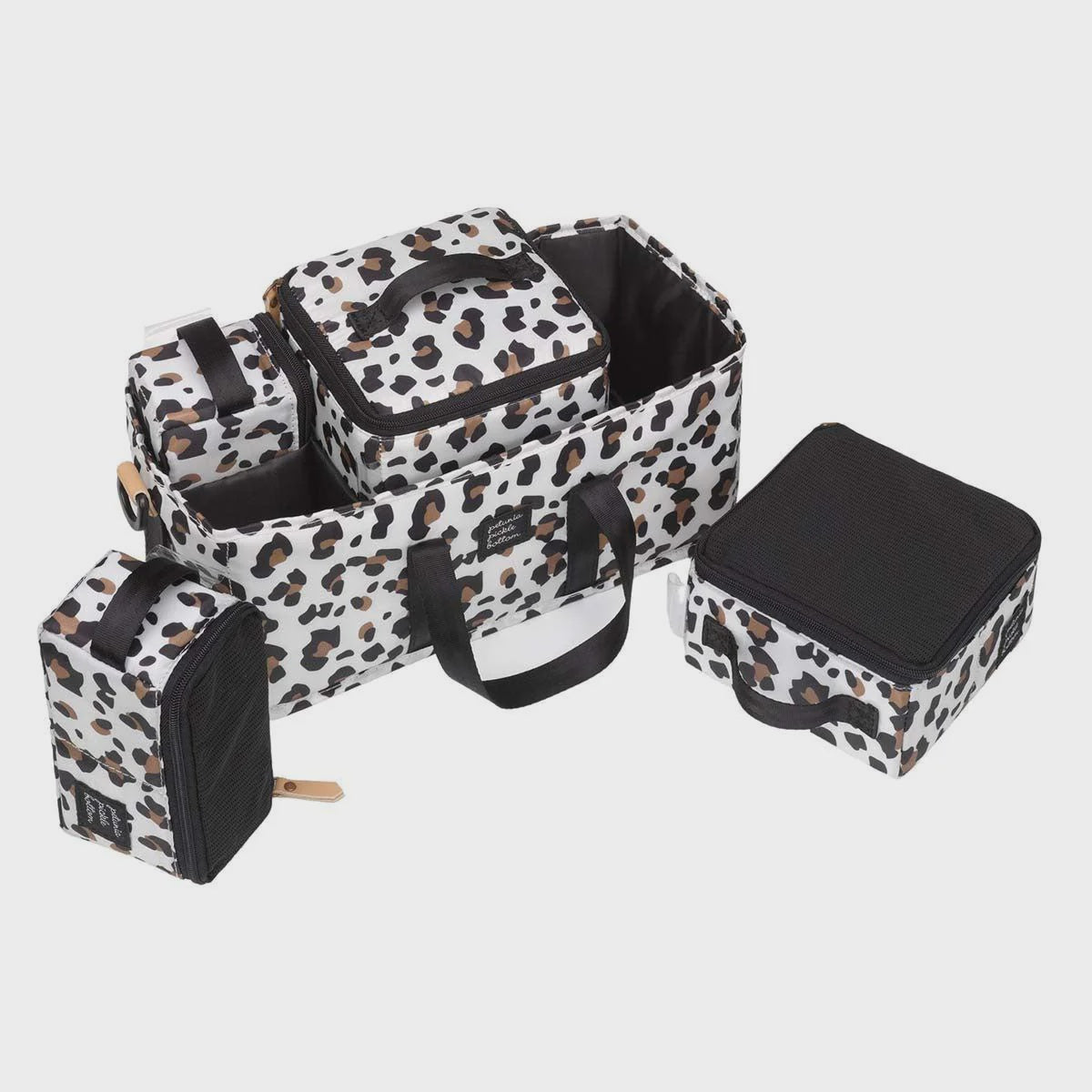 Inter-Mix Deluxe Kit in Leopard print, featuring packing cubes and a Grid Caddy for organized storage in diaper bags, strollers, and nurseries.