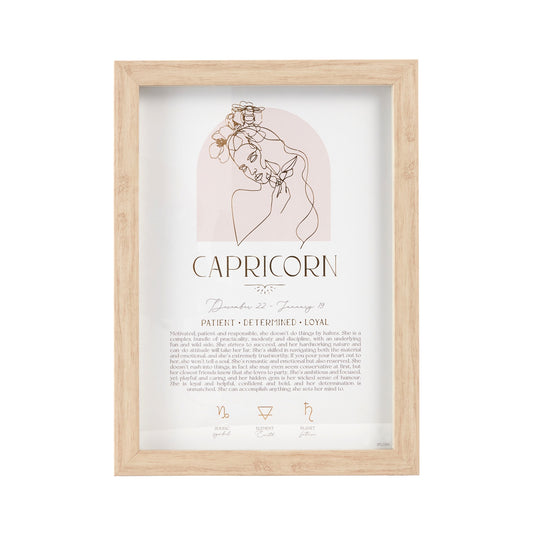 Mystique Framed Print - Capricorn with luxe gold foil details, featuring zodiac symbols, elements, and planets. Includes stand and hooks for hanging. Size: 20x2x33cm.