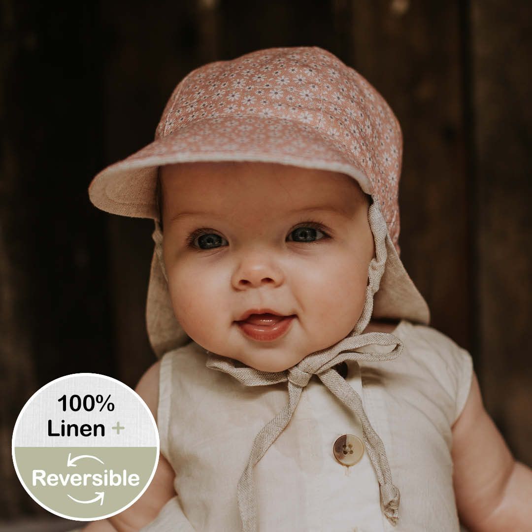 Bedhead Reversible Baby Flap Sun Hat in Polly/Flax, UPF50+ protection, eco-friendly linen, adjustable ties, ideal for babies in prams or carriers.