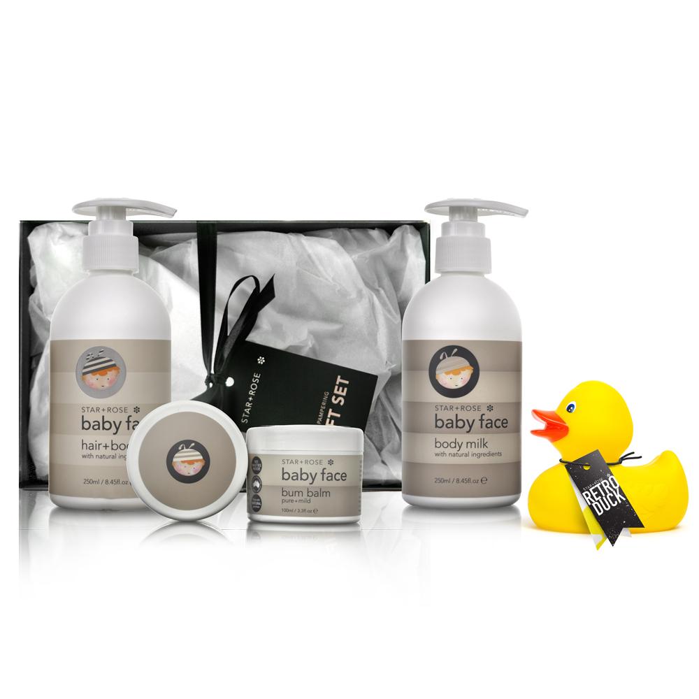 Baby Care Gift Box containing Baby Face Hair + Body Wash, Body Milk, Bum Balm, and Baby Ducky, all made with natural, organic ingredients.