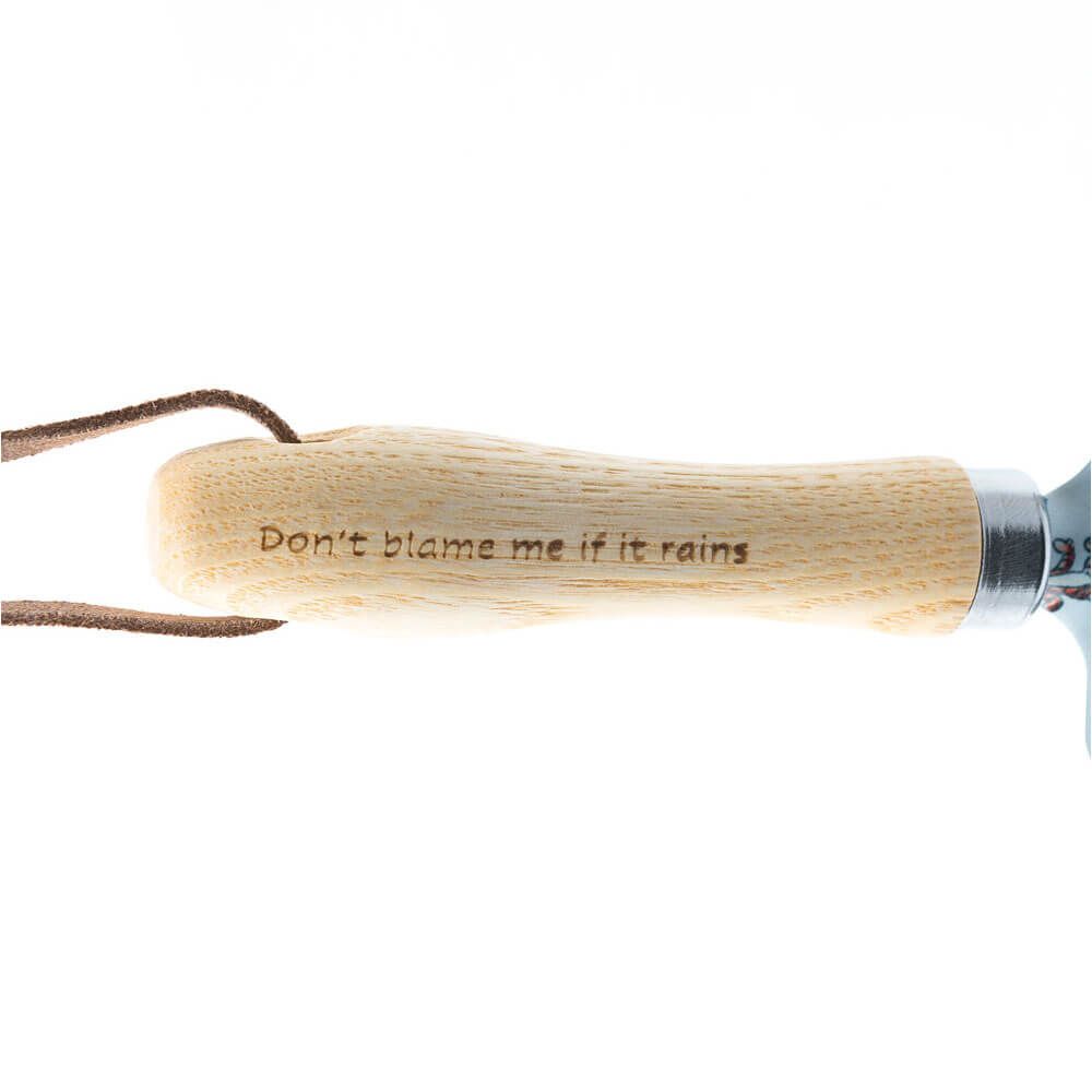 Disney Winnie the Pooh children's gardening trowel with sustainable wood handle. Ideal for kids aged 6-11. With the text encraved "Don't blame me if it rains".