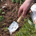 Load image into Gallery viewer, Disney Winnie the Pooh children's gardening trowel with sustainable wood handle.
