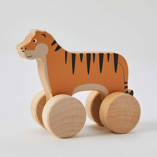 Wooden Rolling Tiger toy made from natural wood with non-toxic paint, perfect for encouraging crawling and walking in young children.